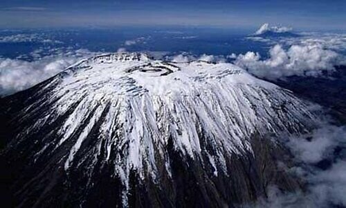 Aerial view of the snow-covered summit crater of Mount Kilimanjaro